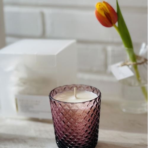 Homemade natural candles in glass